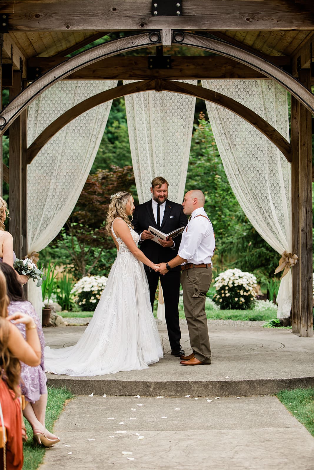 Sharing vows at Rein Fire Ranch Wedding