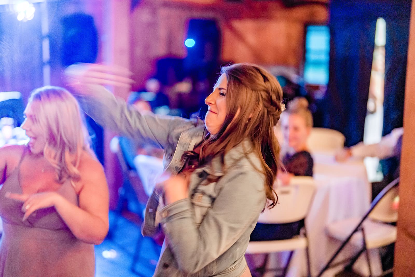 Lady dancing at a Cattle Barn Wedding