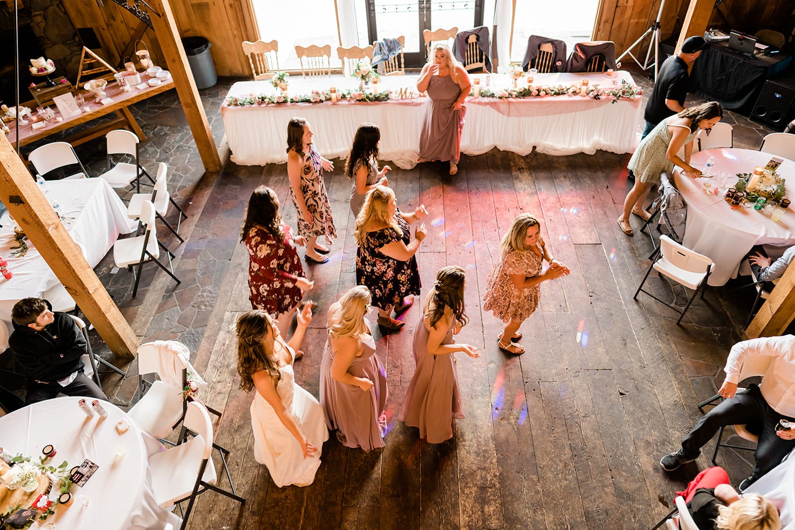 Guests dancing at a Cattle Barn Wedding