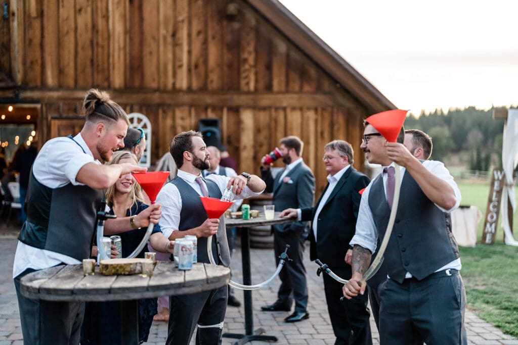 Groomsmen having fun at a Cattle Barn Wedding