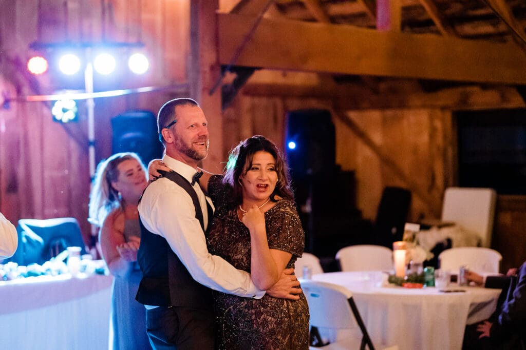 Guest dancing at a Cattle Barn Wedding