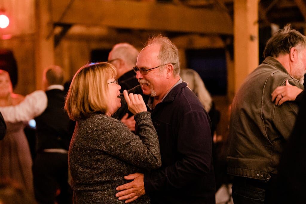 Guest dancing at a Cattle Barn Wedding