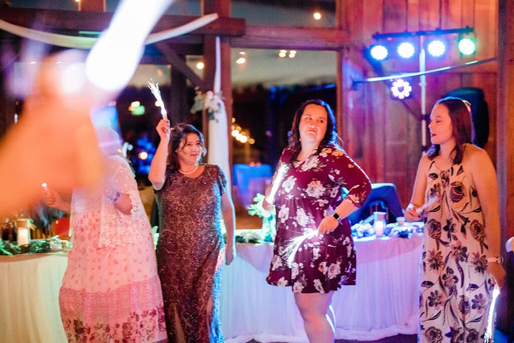 Guest dancing at a Cattle Barn Wedding