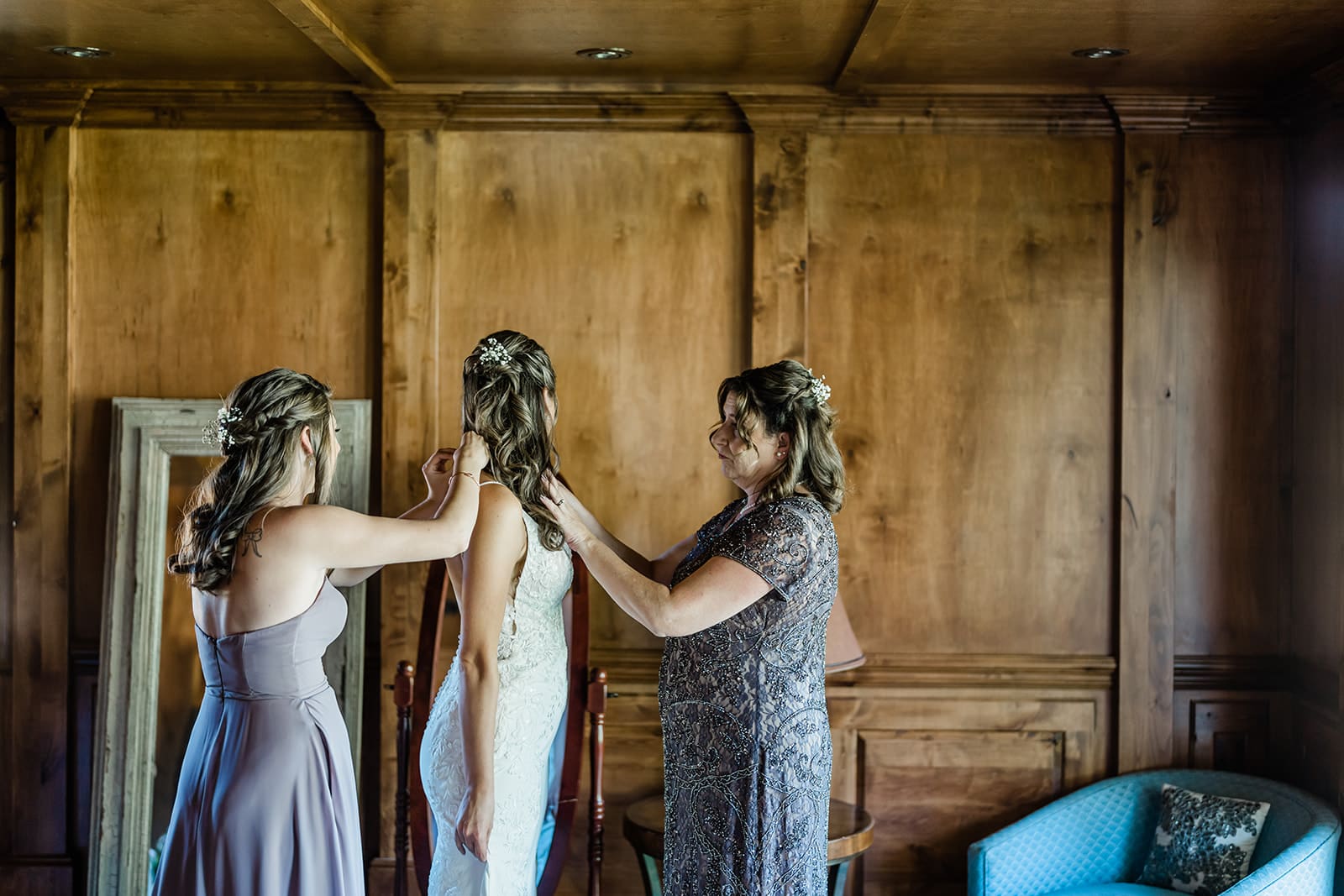 Bride getting ready at a Cattle Barn Wedding