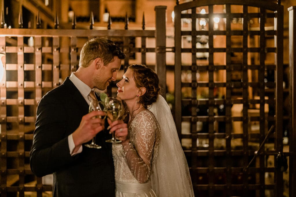 Bride and groom cheers inside Swiftwater Cellars