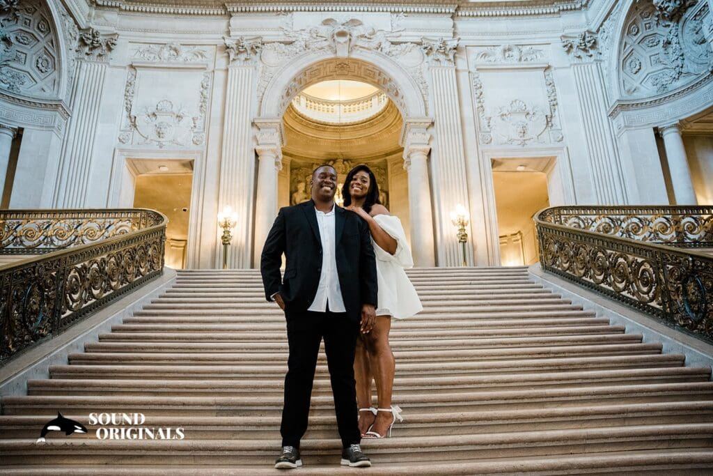 Engagement photo at San Francisco City Hall, one of the 24 Best Places for Engagement Photos in San Francisco, captured by our San Francisco wedding photography & videography team.