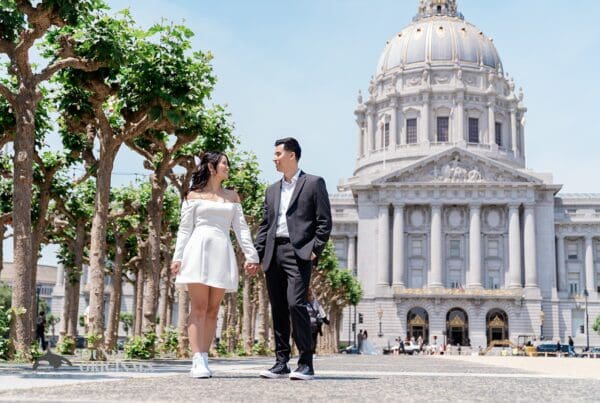 Engagement photo at San Francisco City Hall, one of the 24 Best Places for Engagement Photos in San Francisco, captured by our San Francisco wedding photography & videography team.
