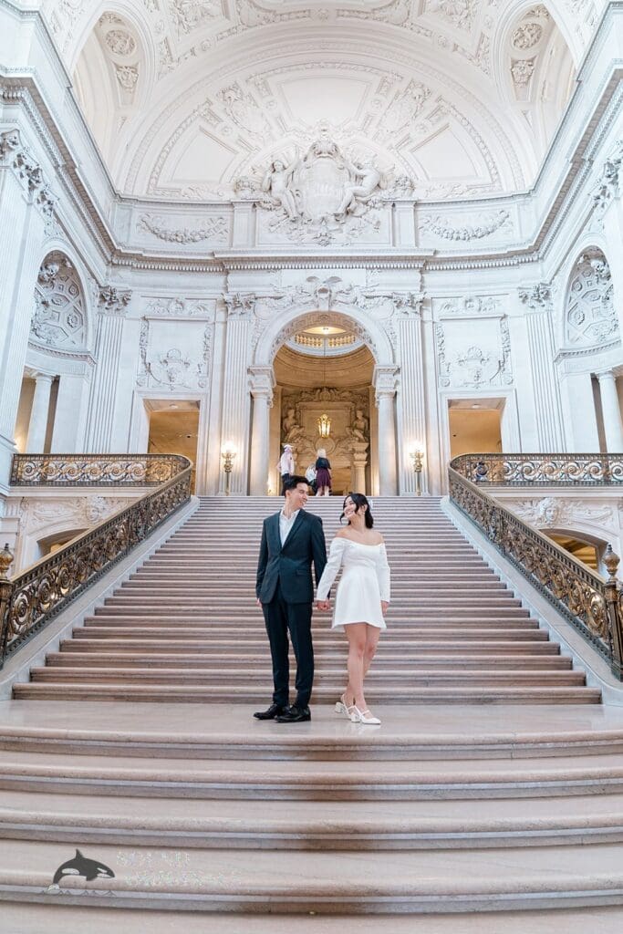 Engagement photo at San Francisco City Hall, one of the 24 Best Places for Engagement Photos in San Francisco, captured by our San Francisco wedding photography & videography team.