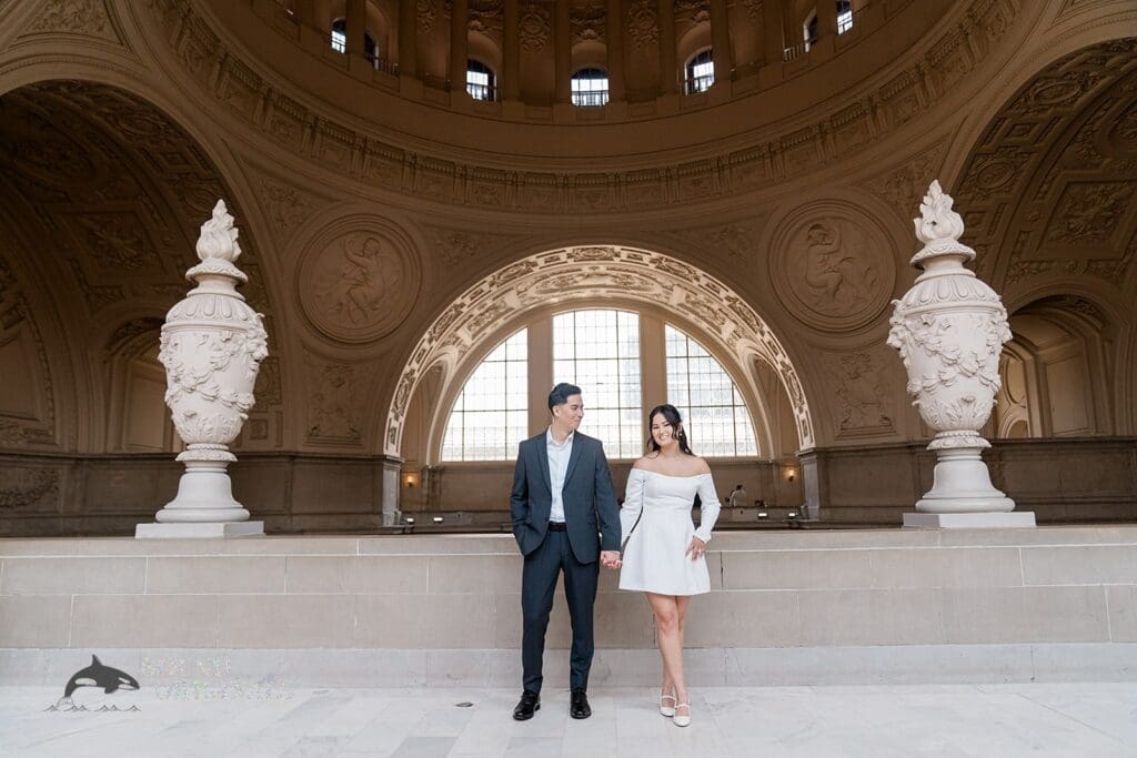 Engagement photo at San Francisco City Hall, one of the 24 Best Places for Engagement Photos in San Francisco, captured by our San Francisco wedding photography & videography team.