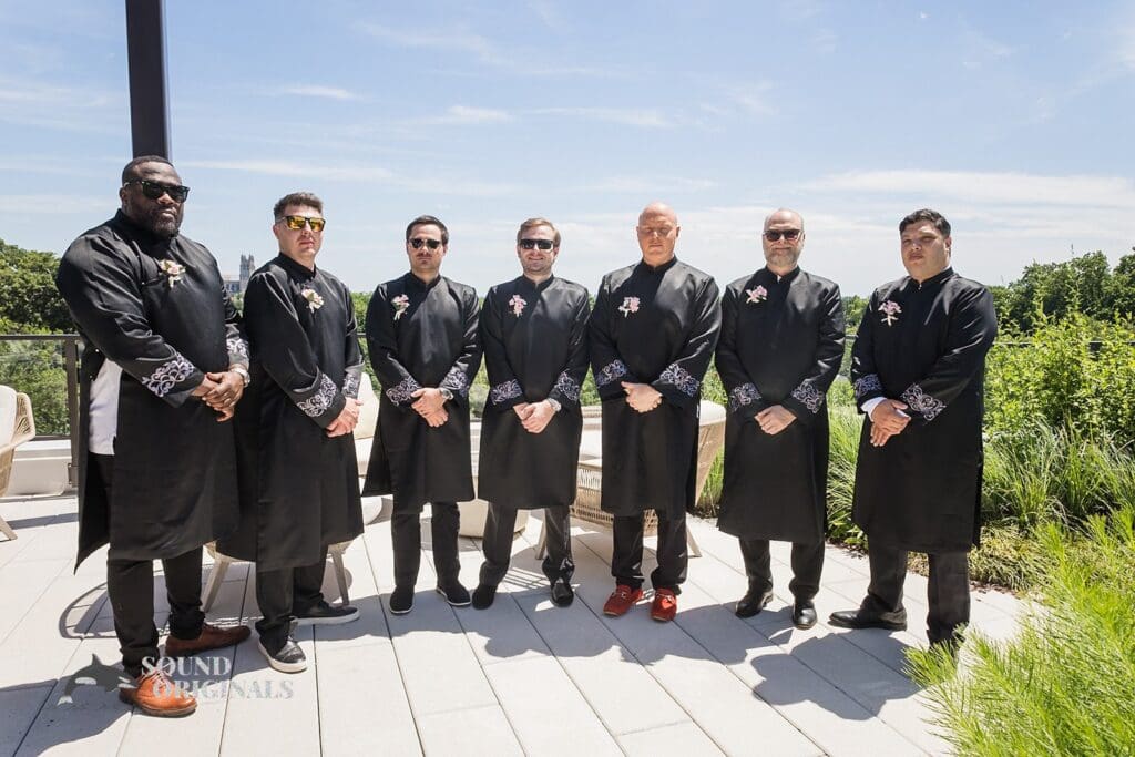 Photographer captures elegant groom's men at wedding venue