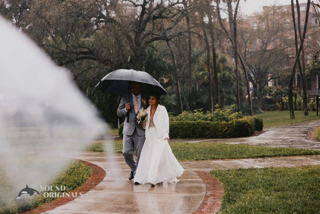 Nicole + Ryan Bride and groom walk down the surroundings of Plant Park, Jackson's, Yeomans