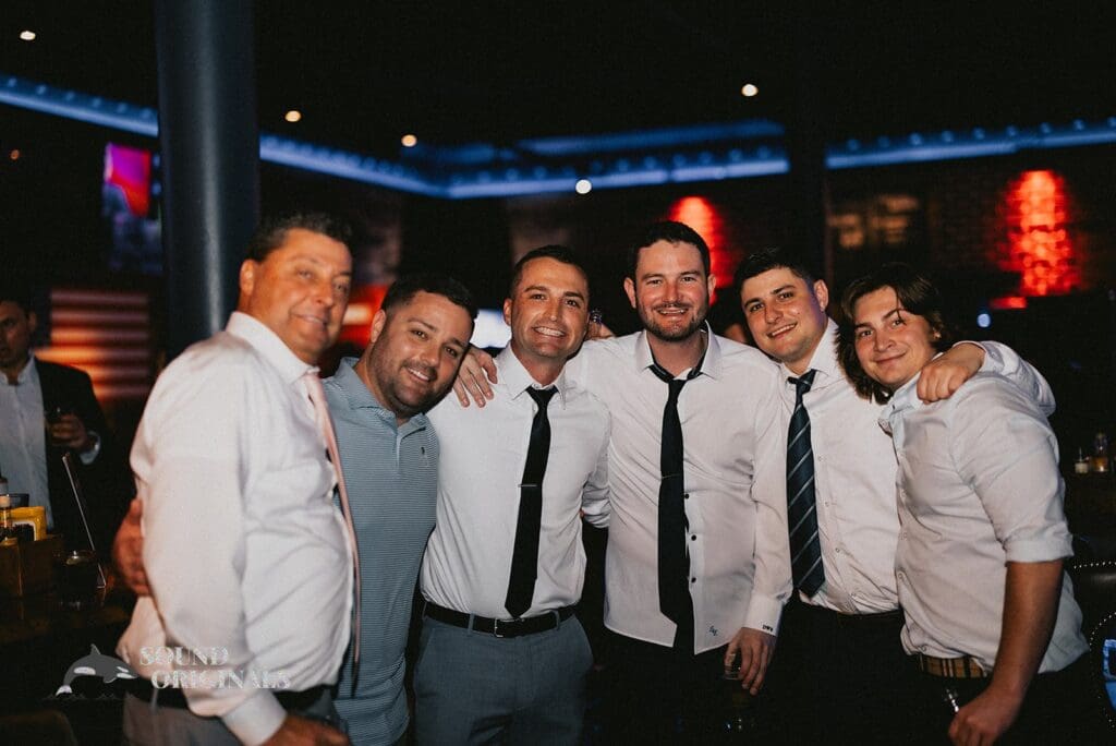 Nicole + Ryan Handsome groom with the groom's men in Plant Park, Jackson's, Yeomans Wedding