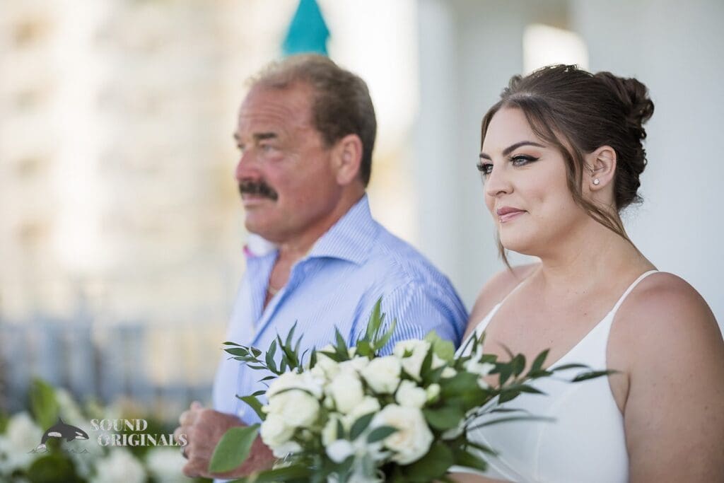Bride walks down aisle at Cadillac Hotel and Beach