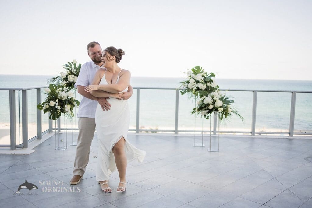 happy couple at Cadillac Hotel and Beach