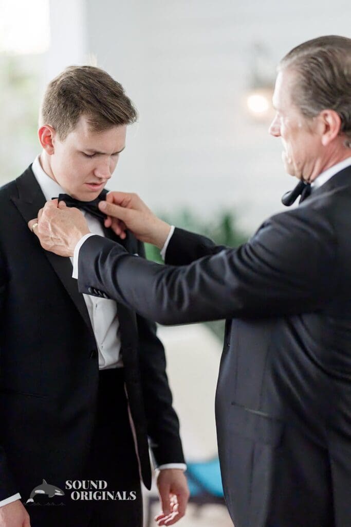 The groom having a special moment with family member at The Palms Hotel & Spa Wedding