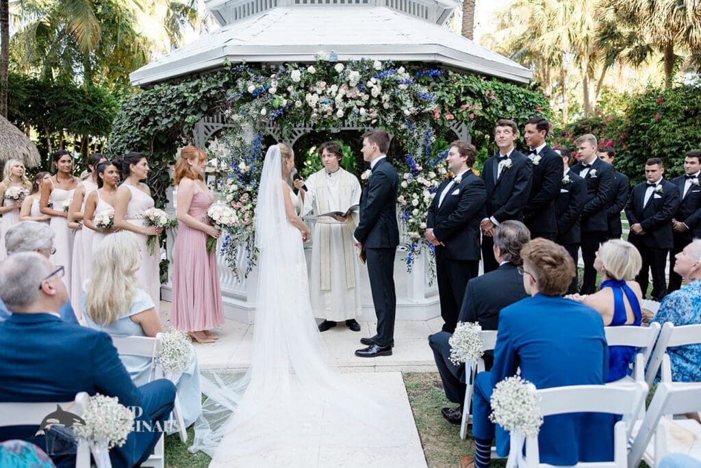 Couple exchanging vows at The Palms Hotel & Spa Wedding