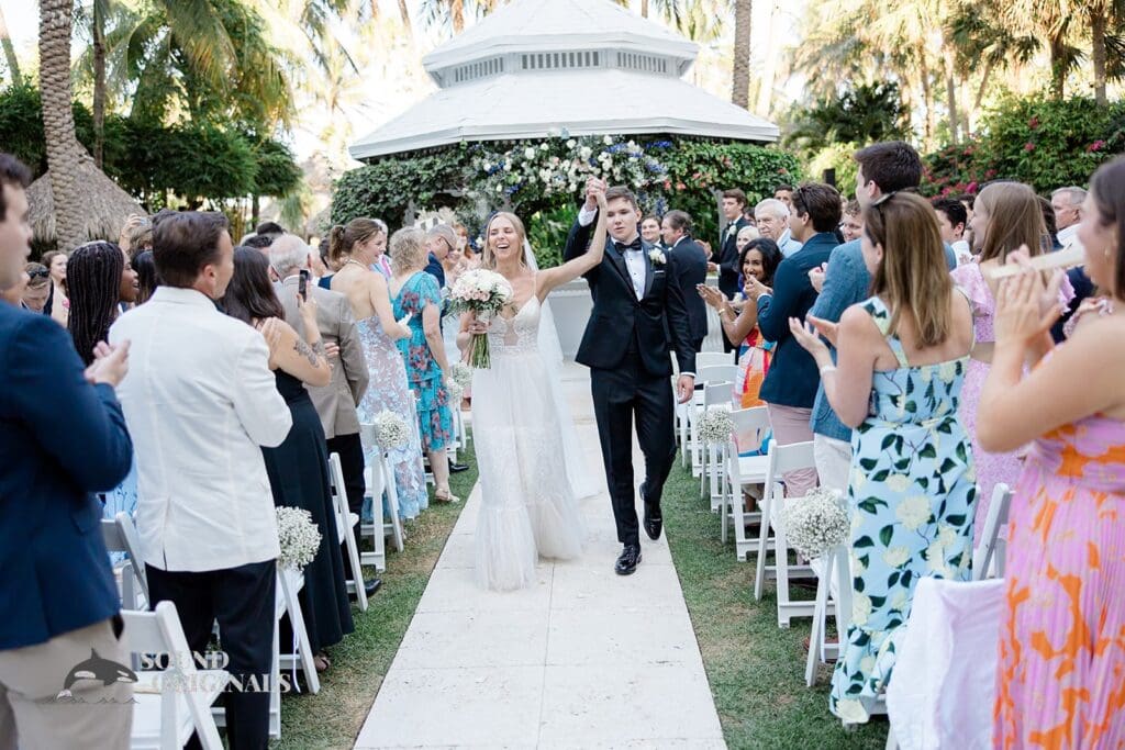 The happy couple celebrating their The Palms Hotel & Spa Wedding
