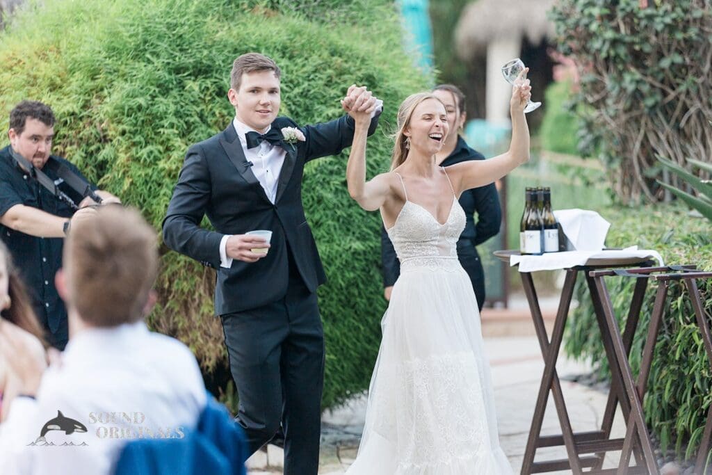 The entrance of the bride and groom at The Palms Hotel & Spa Wedding