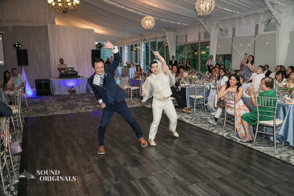 Bride dancing with guest at Monte Bello Estate Wedding