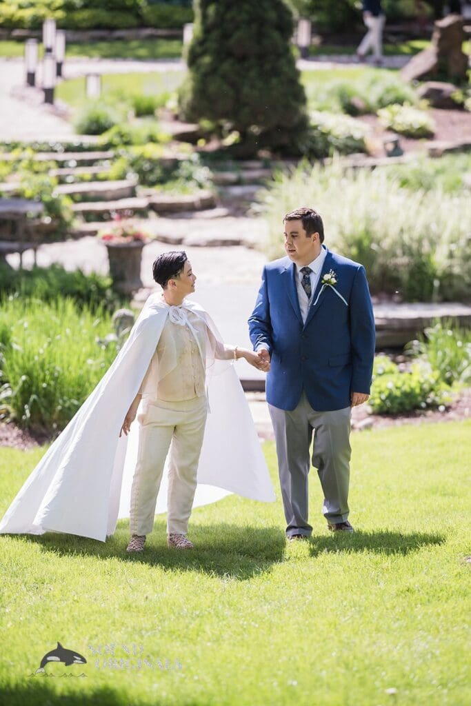 Bride and groom walking in the grounds of Monte Bello Estate