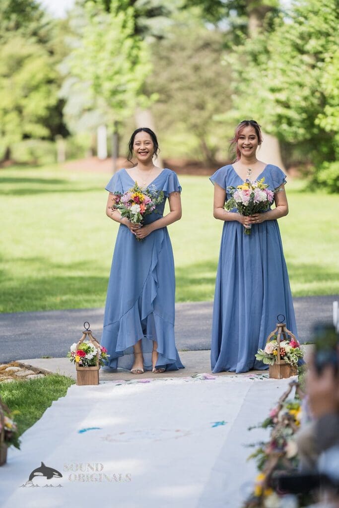 Bridesmaids walking down the aisle at Monte Bello Estate Wedding
