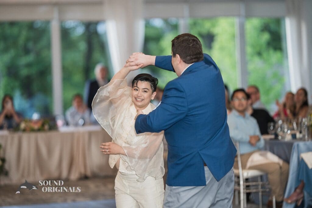 Groom spins bride around at Monte Bello Estate Wedding