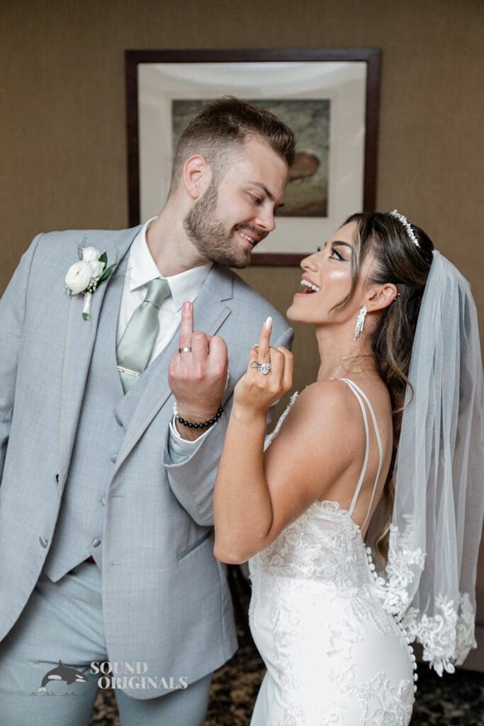 Royal Melbourne Country Club Wedding Couple show their wedding rings at their Royal Melbourne Country Club Wedding