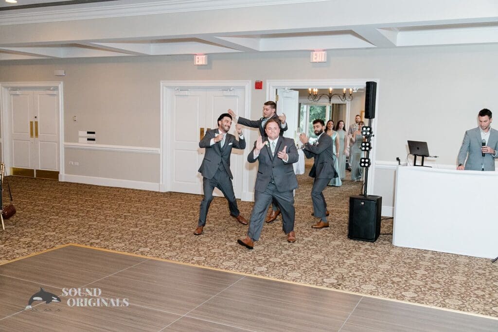 Royal Melbourne Country Club Wedding The entrance of the groomsmen at the Royal Melbourne Country Club Wedding reception