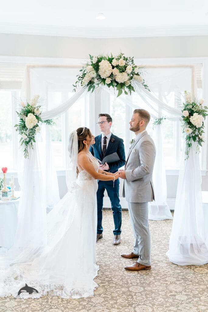 Royal Melbourne Country Club Wedding Portrait of bride and groom at altar of their Royal Melbourne Country Club Wedding