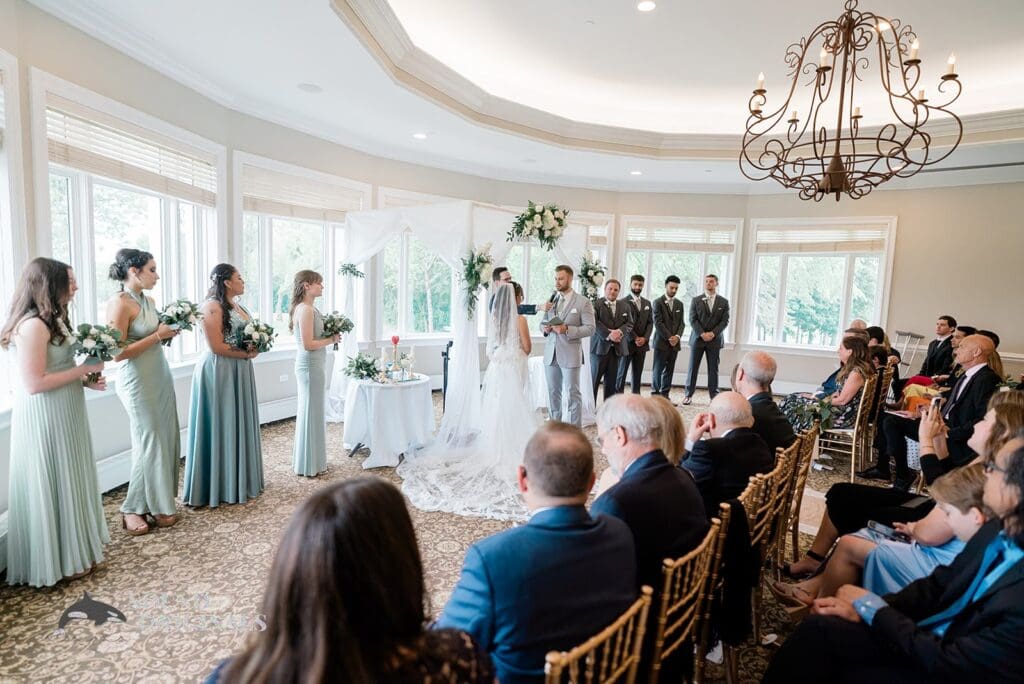 Royal Melbourne Country Club Wedding The Royal Melbourne Country Club Wedding ceremony with groom reading his vows