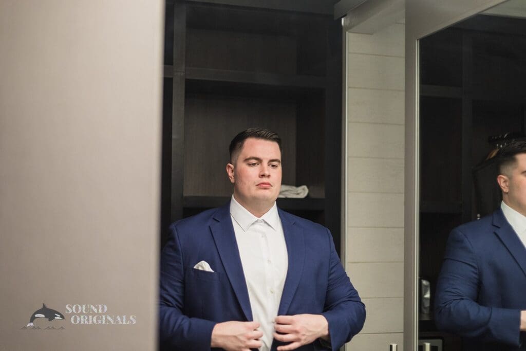 Groom getting dressed at Willows Heights Mansion