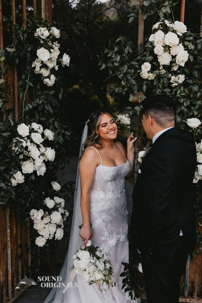 Photographer captures beautiful bride and groom beside The Havens Country Club Wedding altar