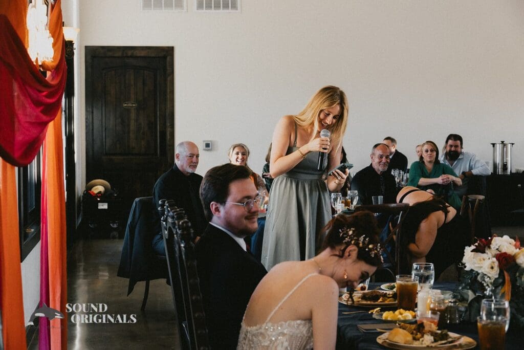 Bride laughing at speeches at Stoney Ridge Villa Wedding