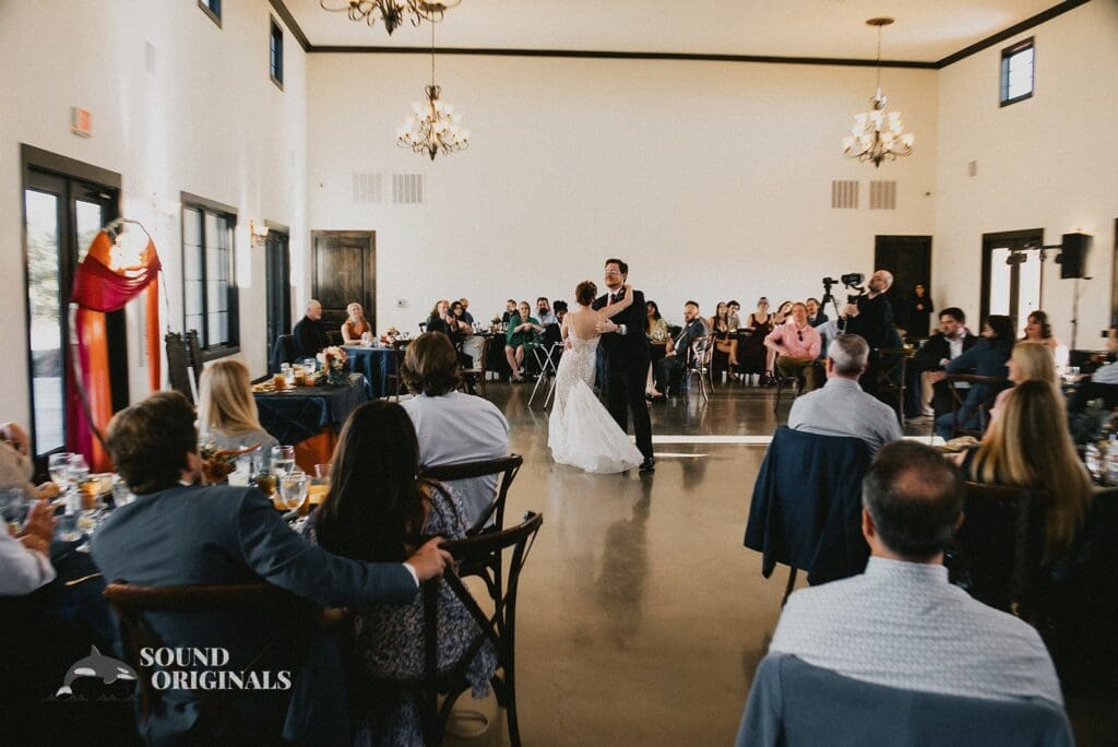 Husband and wife enjoy first dance at Stoney Ridge Villa Wedding