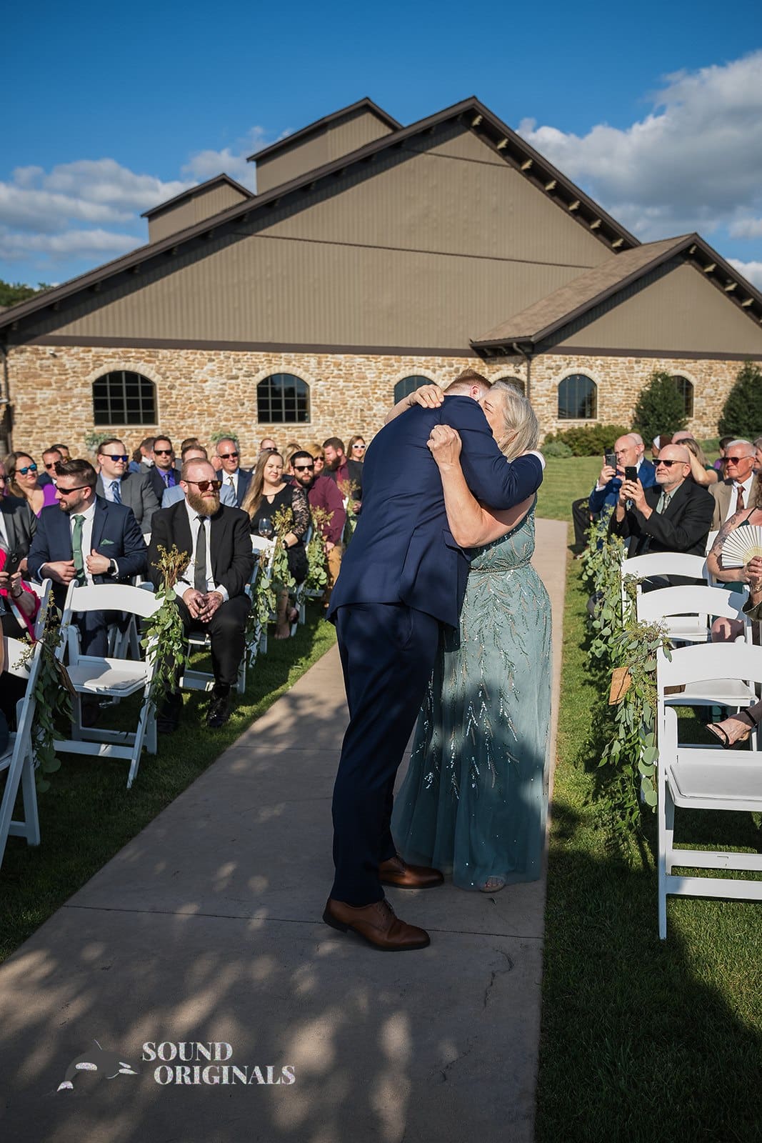 Mother with happy tears for his son on his wedding day at Folino Estate Winery