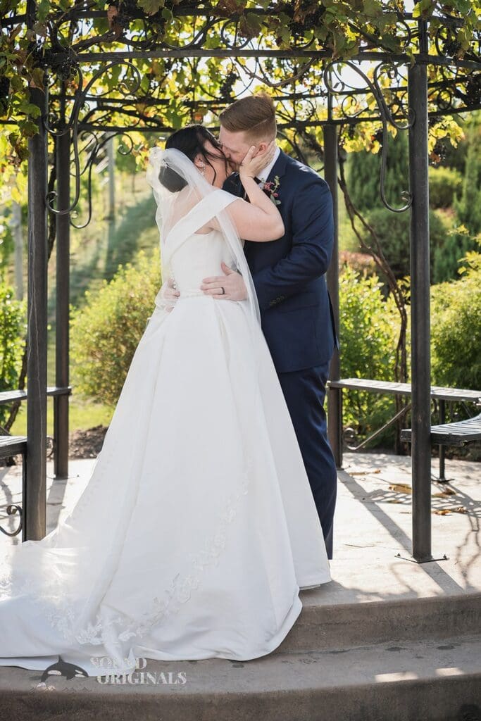 Newlyweds first kiss at Folino Estate Winery