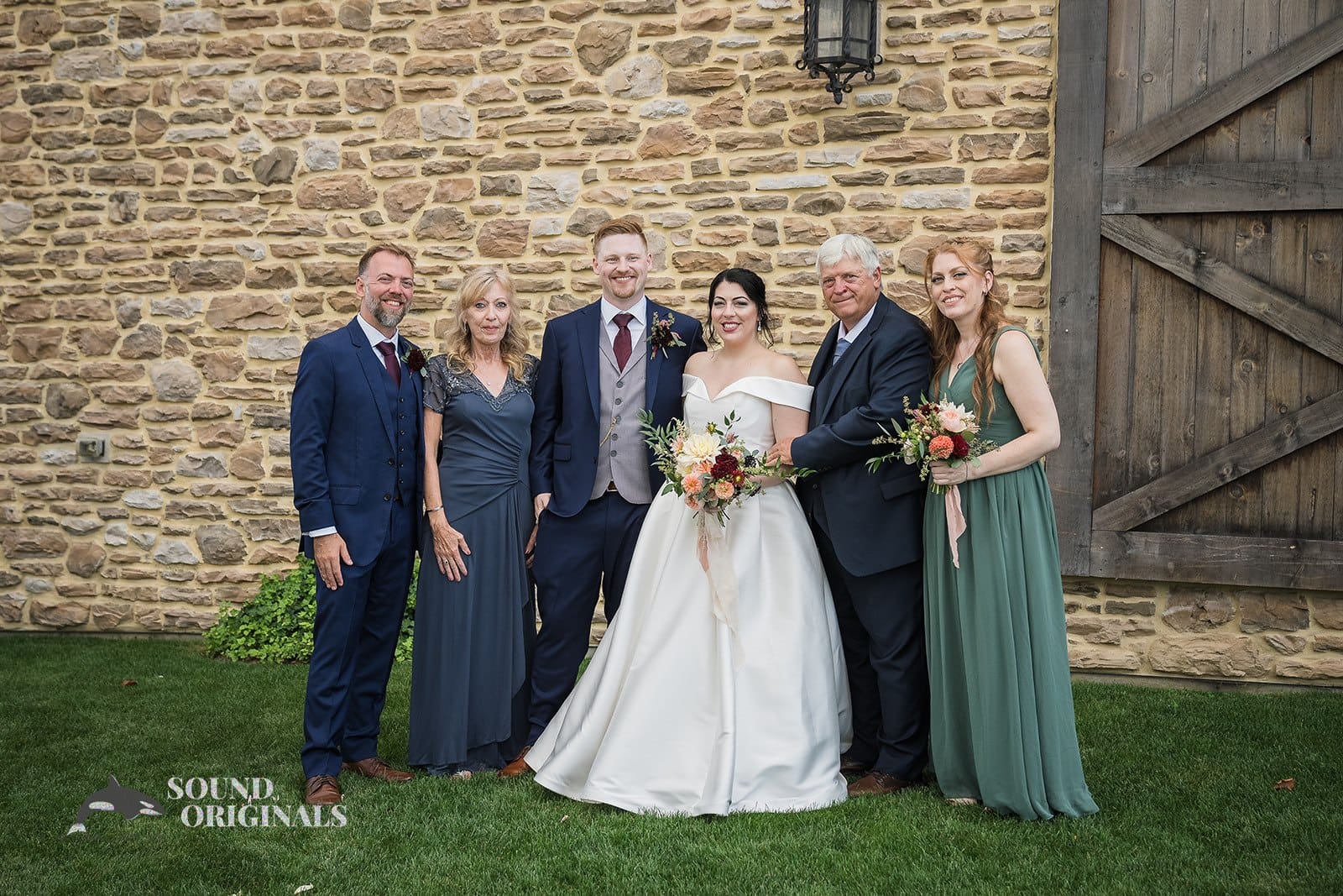 Newlyweds with bride's side of the family at Folino Estate Winery