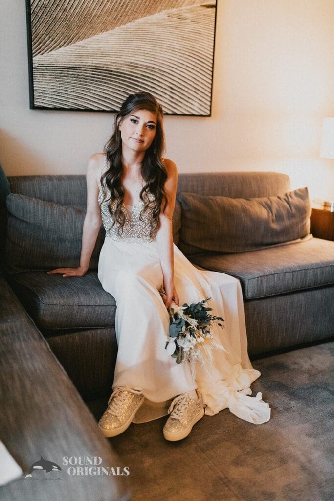 Nicole + Ryan Plant Park, Jackson's Yeomans Wedding bride, sits pretty on the Plant Parks, Jackson's, Yeomans couch