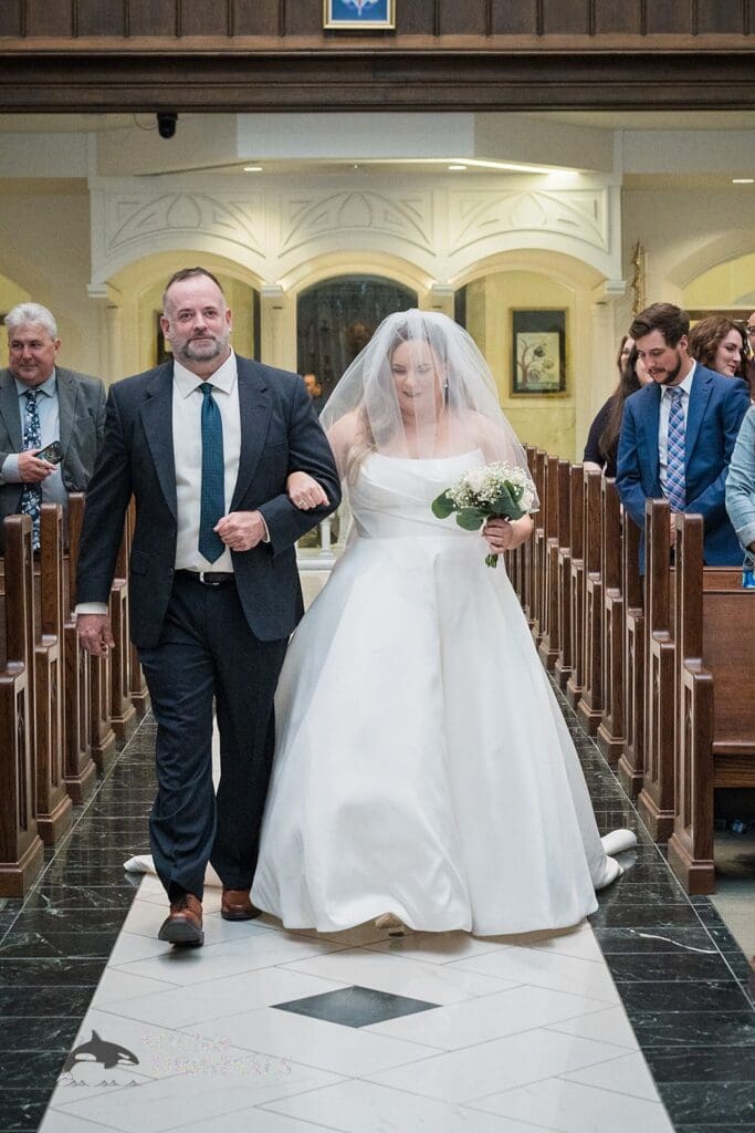The entrance of the bride at the Cathedral Basilica of the Immaculate Conception Wedding