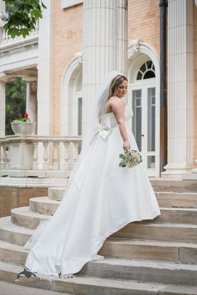 Wedding photographer captures stunning image of bride at the Cathedral Basilica of the Immaculate Conception Wedding