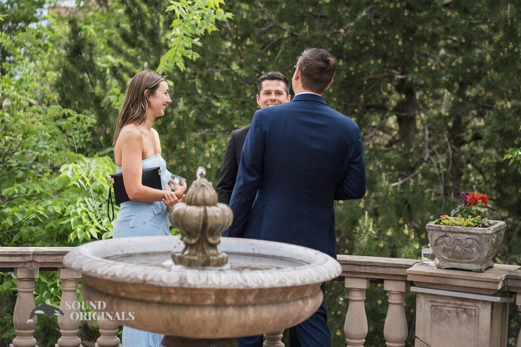 Wedding guests talking after Cathedral Basilica of the Immaculate Conception Wedding