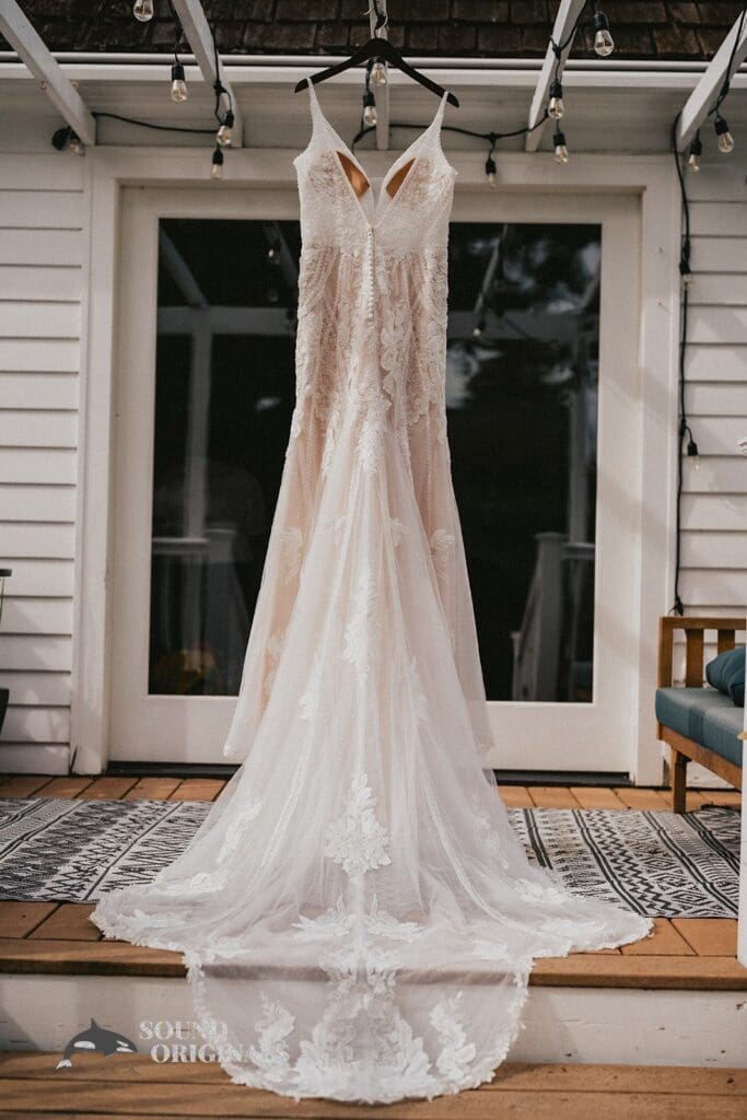 Kiara + Paul A wedding gown with a veil stands beautifully at The Carey Gardens Wedding