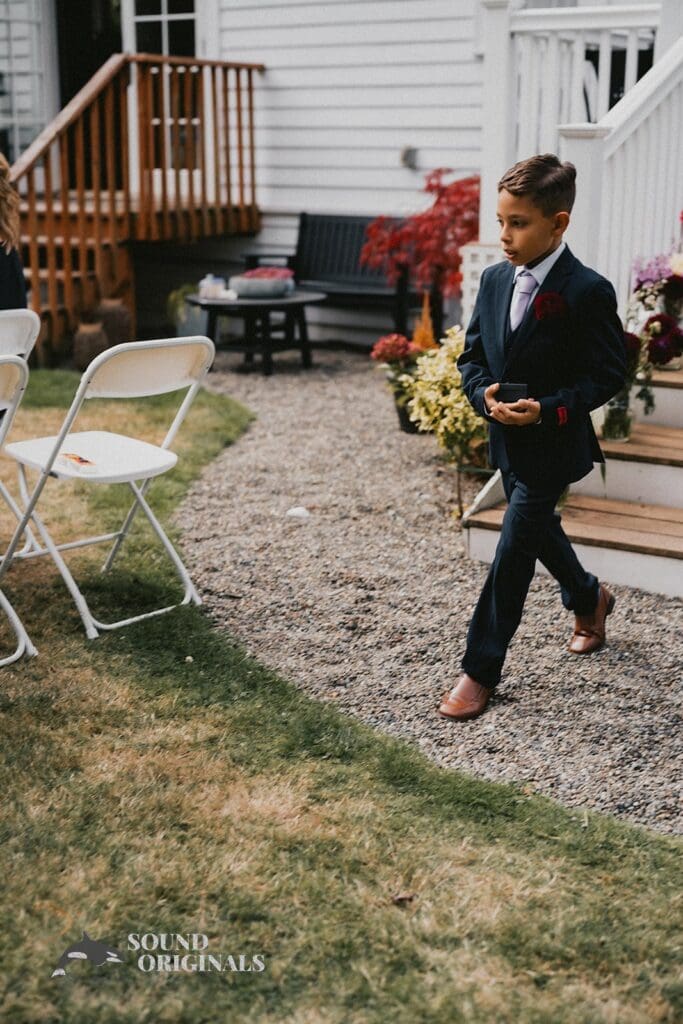 Kiara + Paul Groom's boy looking cute at The Carey Gardens Wedding