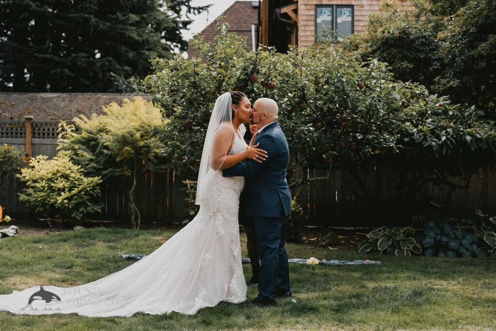 Kiara + Paul Husband and wife tie their marital bliss with a kiss at The Carey Gardens