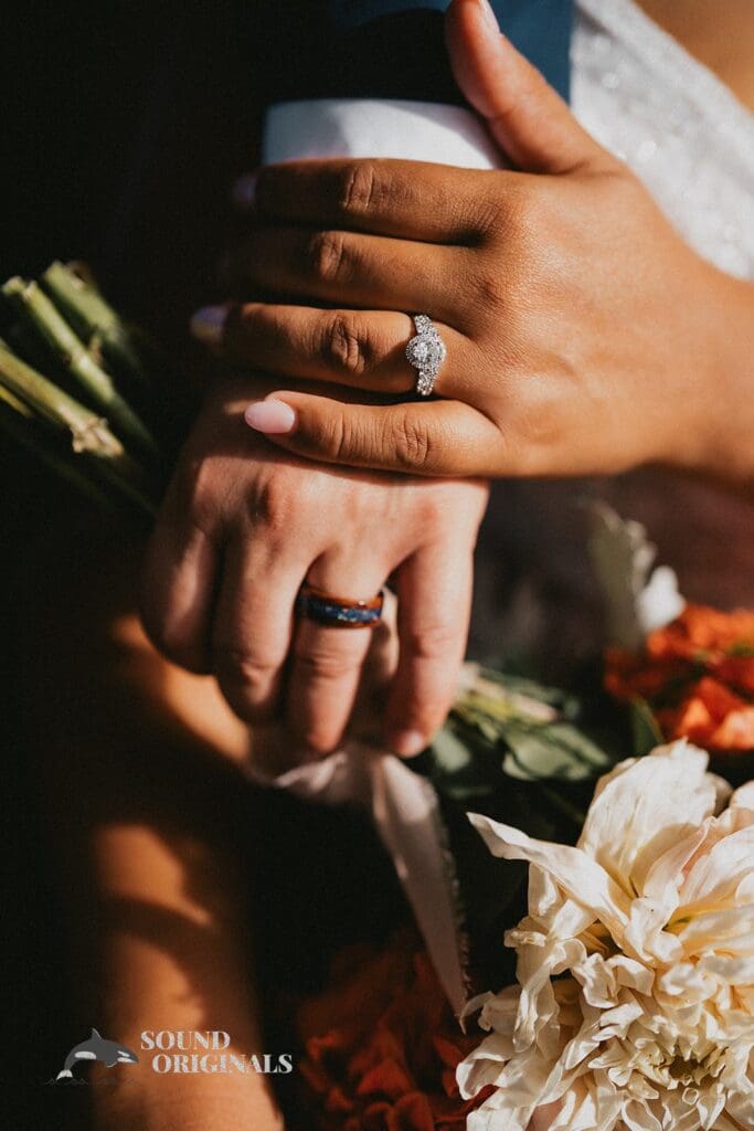Kiara + Paul Husband and wife show off stunning diamond rings at The Carey Gardens Wedding
