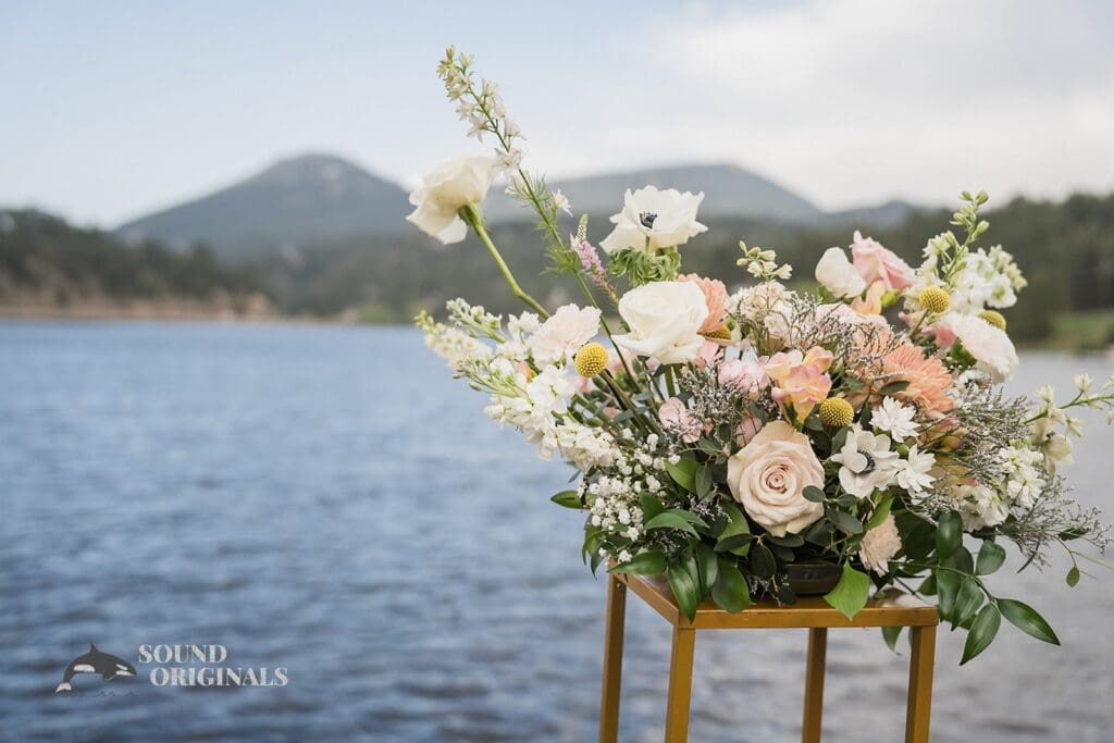 Radiant flowers seen at the altar of the Evergreen Lake House Wedding