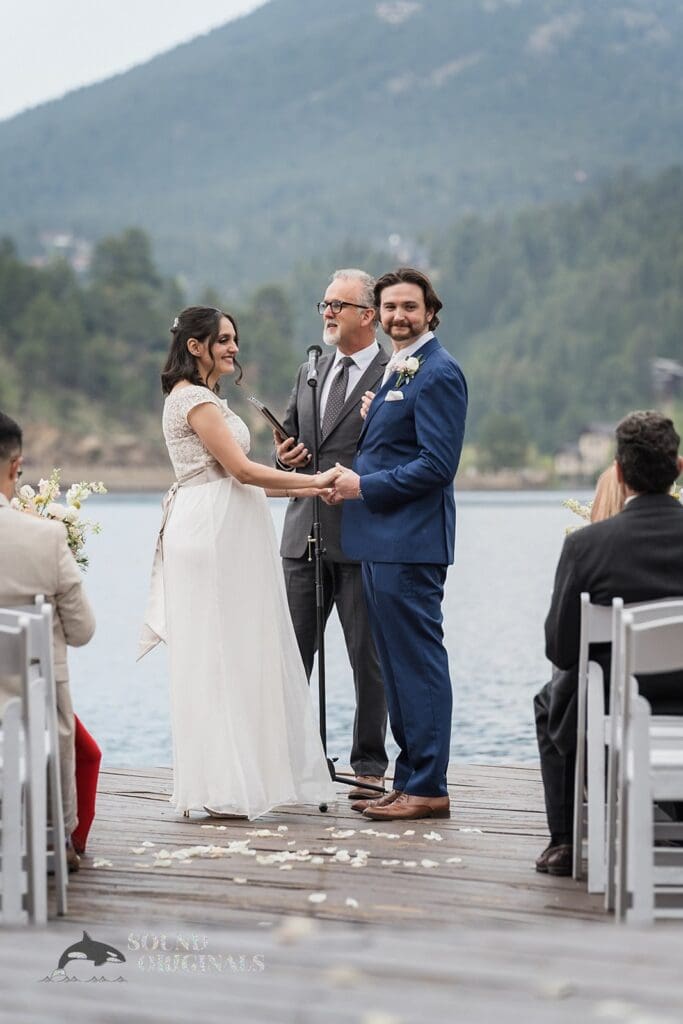 Evergreen Lake House Wedding priest ready to wed bride and groom
