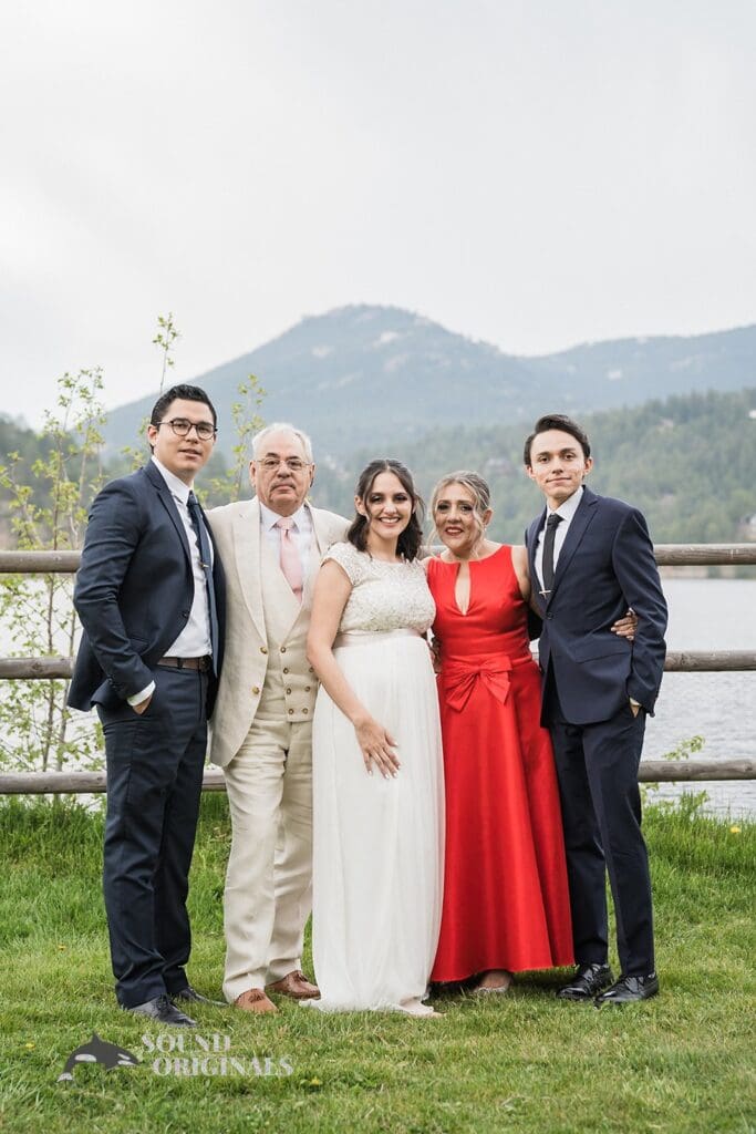 Pretty bride with her family in Evergreen Lake House Wedding
