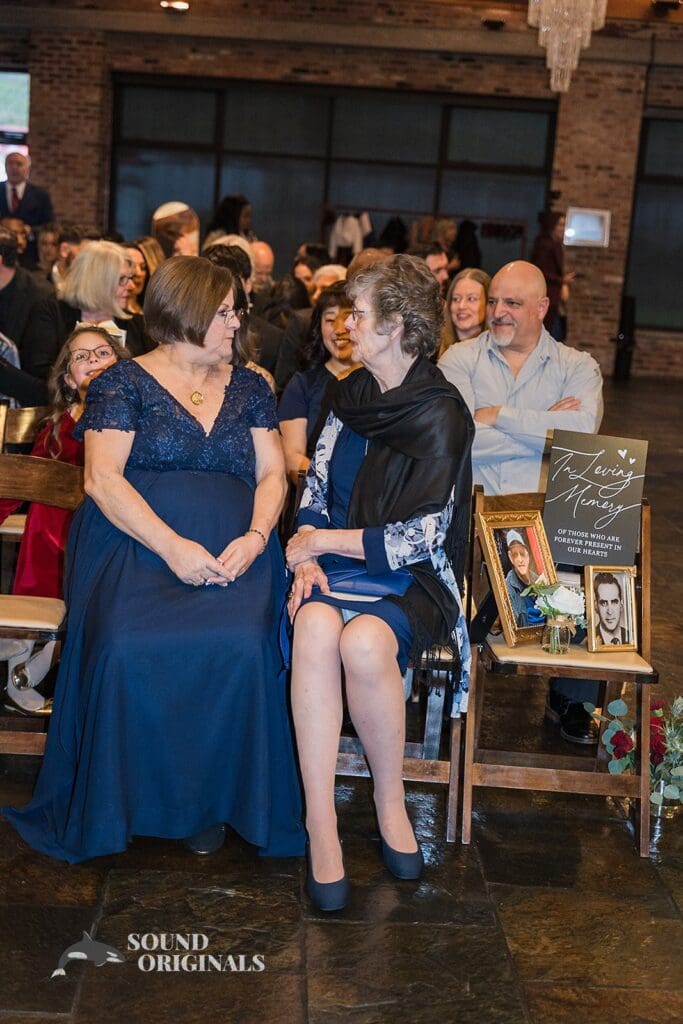 Bride's mother and friend talking at the Historic 1625 Tacoma Place Wedding