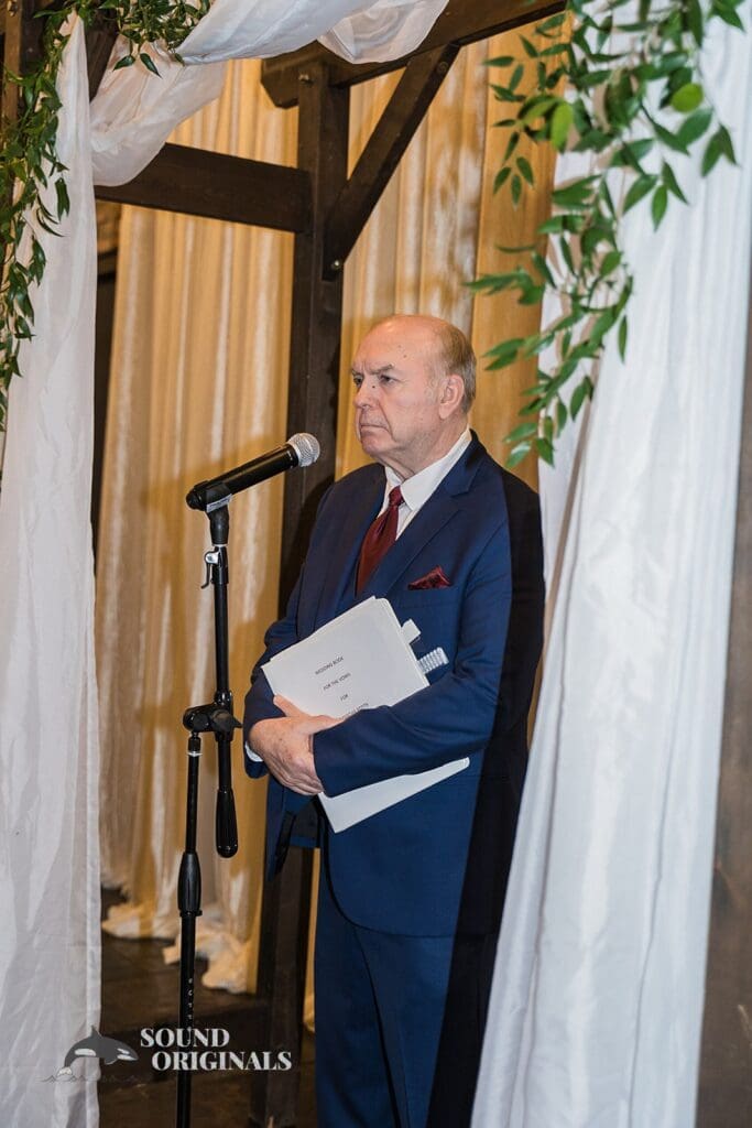 Priest ready to wed bride and groom at Historic 1625 Tacoma Place Wedding